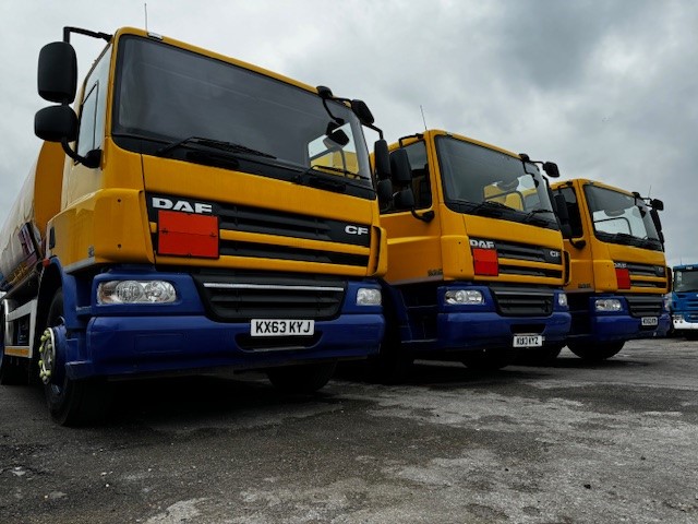 A 2013 DAF CF 75.310 6x2 fuel tanker with 18,000-liter capacity and hose & reel, one of three identical tankers available from Clugston International.