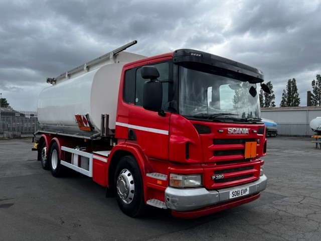 Side View: 2011 Scania P320 6x2 fuel tanker with 20,000-liter capacity, 4 compartments, and hose & reel for efficient fuel delivery.