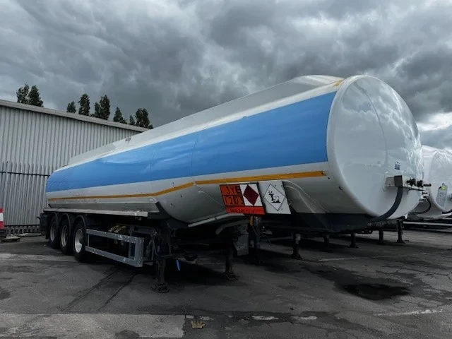 Used 2016 COBO fuel tanker trailer with 6 compartments for fuel transportation.