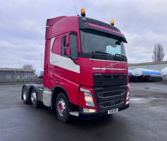 2018 Volvo FH500 6x2 mid-lift tractor unit, featuring Euro 6 engine, iShift gearbox, and dual beacons, available for worldwide shipping to any international port in Europe, Asia, Africa, South America, the Caribbean or Oceania.