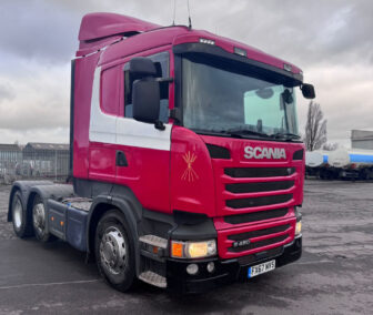2018 Scania R450 6x2 Mid-Lift tractor unit in red and white livery, automatic transmission, PTO hydraulics, tested until 2025. One of two identical units available. Registration FX67 NVS.