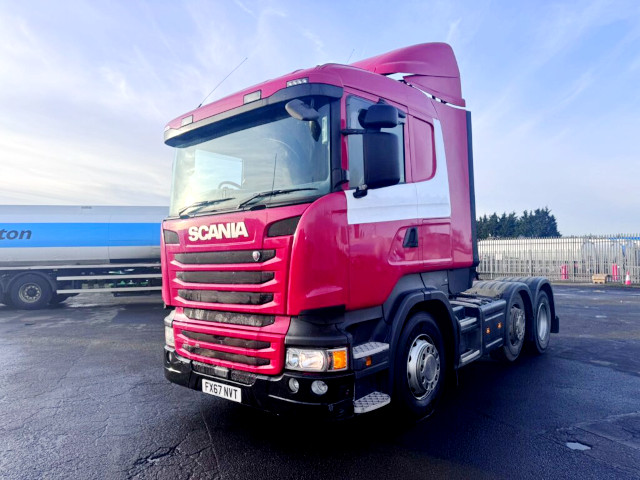 Red scania r450 tractor unit, rated #4 in top used trucks for malta, ideal for international routes via sicily