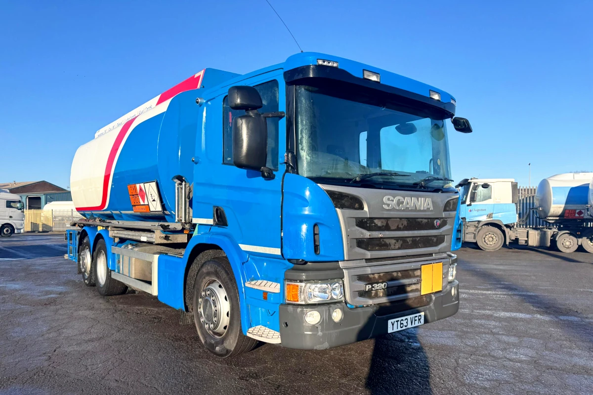 2013 Scania P320 6x2 fuel tanker in blue, featuring 20,000L compartmented aluminium barrel, Alpeco metering system, and front-mounted delivery equipment