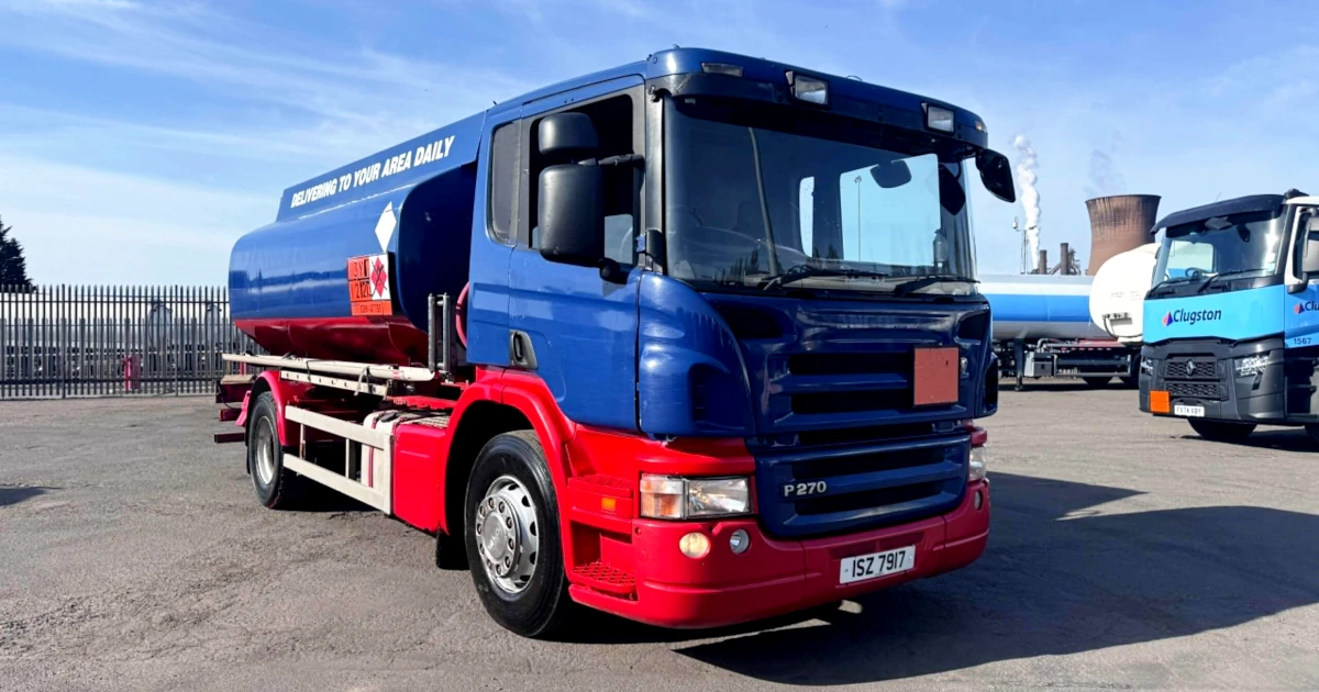 2008 Scania P270 right hand drive fuel tanker truck (lorry) in blue and red, available for export from the UK. Ideal for fuel transport and distribution in Africa, Asia, and South America.