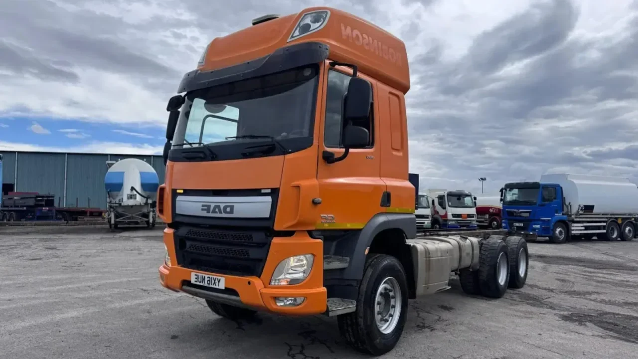 An orange 2016 DAF CF400 6x4 chassis cab truck. Click to play a video walkaround of this used DAF truck for sale in the UK.