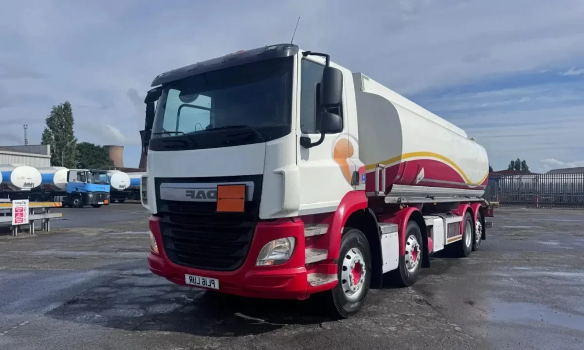 A red and white 2016 DAF CF410 8x2 fuel tanker truck. Click to play a video walkaround of this used DAF truck for sale.