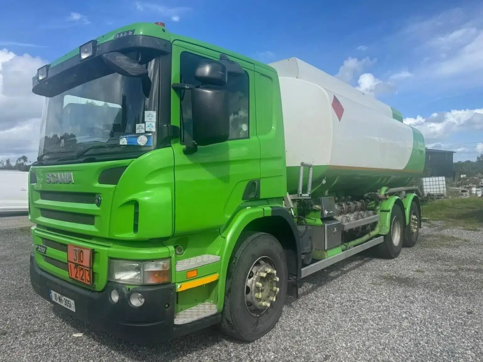 A 2010 Scania P320 6x2 fuel tanker for sale in the UK, with 460,611 kms. This truck features a 20,000-litre, five-compartment aluminium barrel, manual gearbox, and a LectroCount digital metering system.