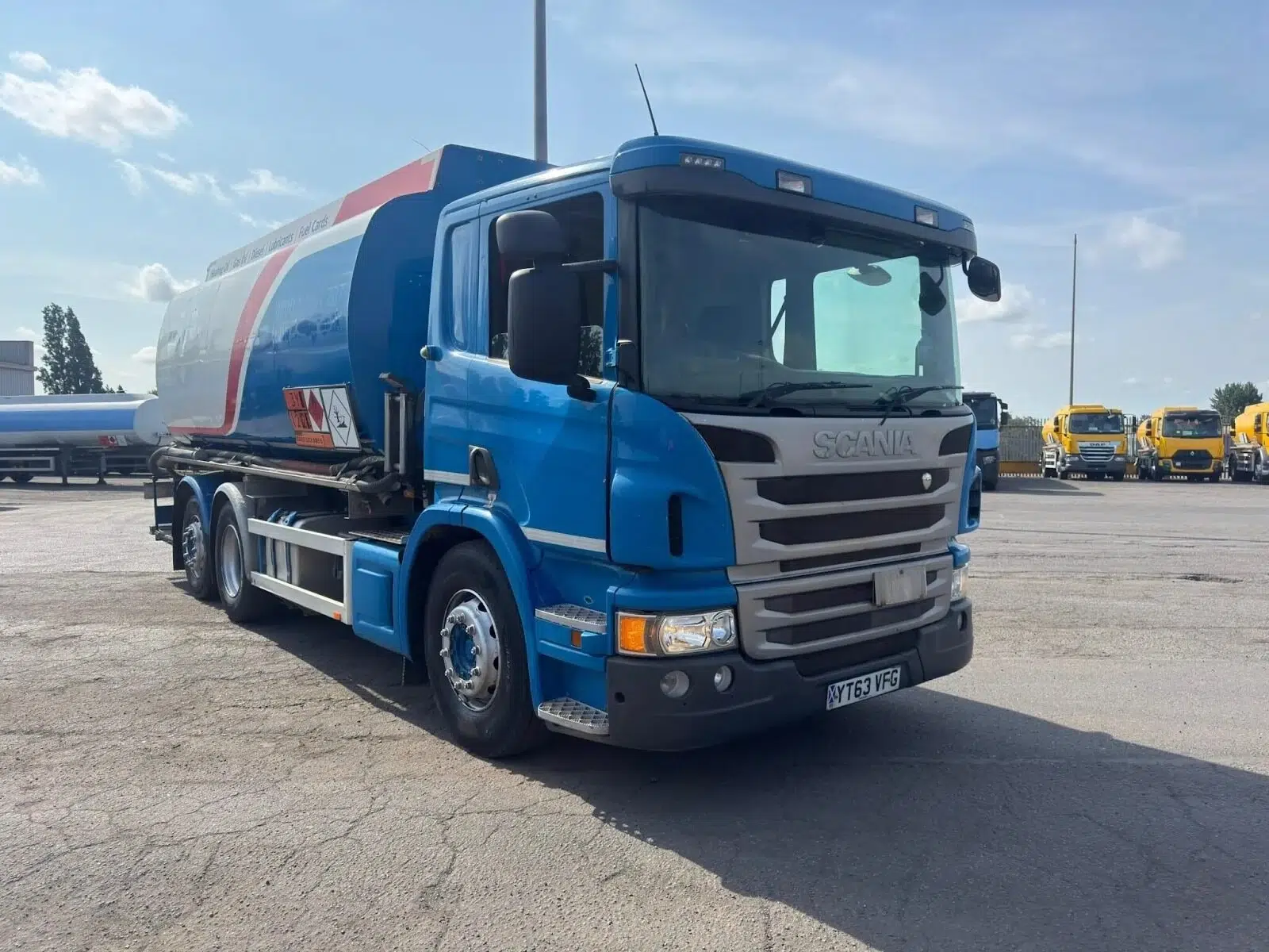 A 2013 Scania P360 6x2 fuel tanker, available for export from the UK. Features a 20,000-litre, 5-compartment aluminium tank, manual gearbox, and Alpeco digital metering system. Euro 5 specification with 506,499 kms.